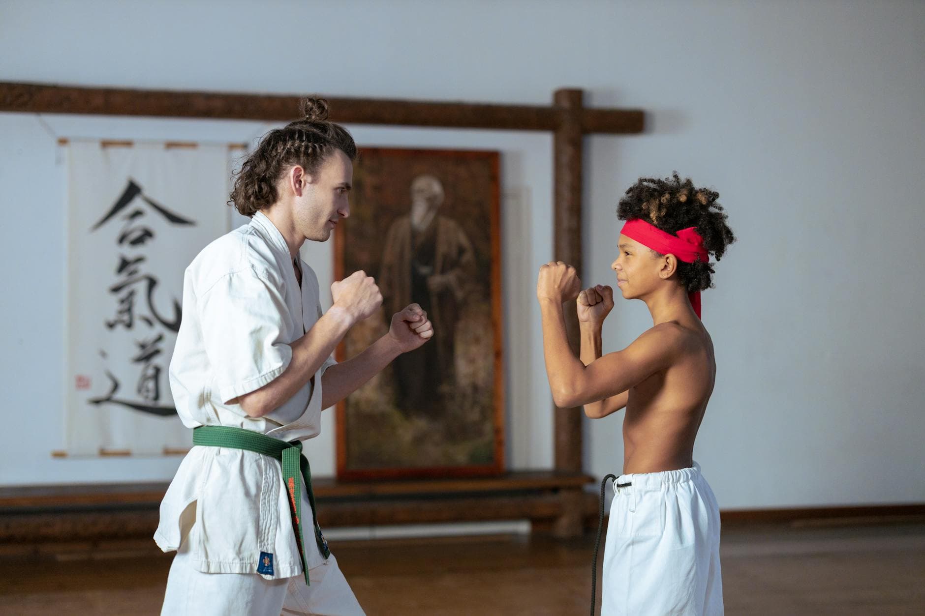 Martial arts students training in a dojo
